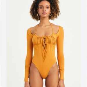 Iamnotbasic Tina bodysuit mustard orange I am not basic strappy ties Sz L‎